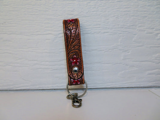 Tooled leather with painted red flowers